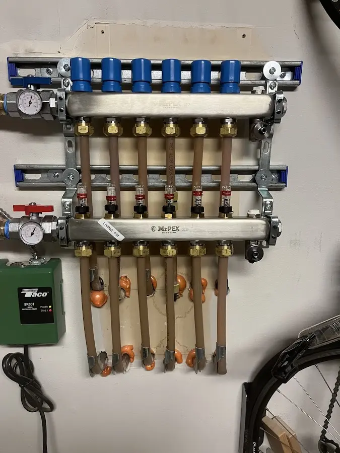 Plumber performing Water Heater Repair at a residential property in Wheatfield